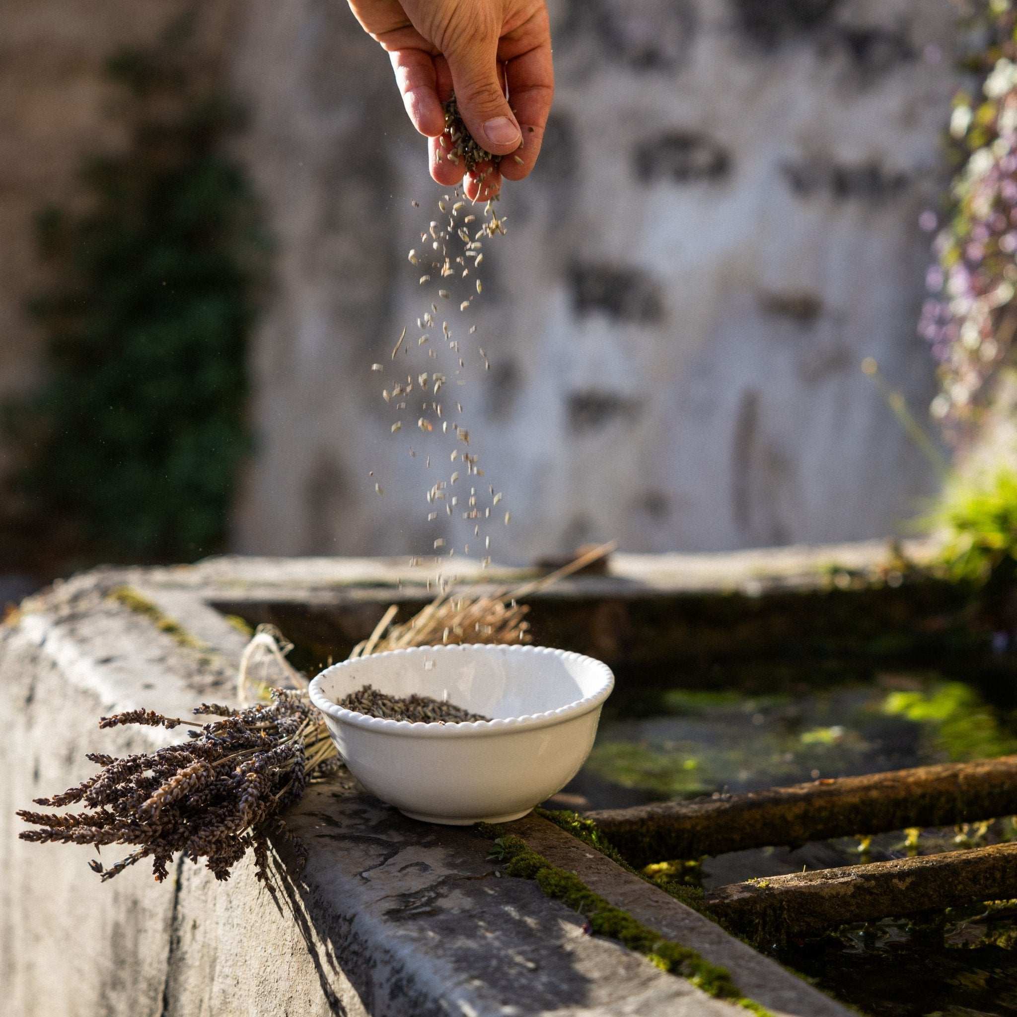 An organic dried lavender pouch from Céline en Provence, used for freshening up clothes and spaces with a calming scent.