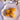 Overhead view of handmade almond croquants on a ceramic plate, Provence