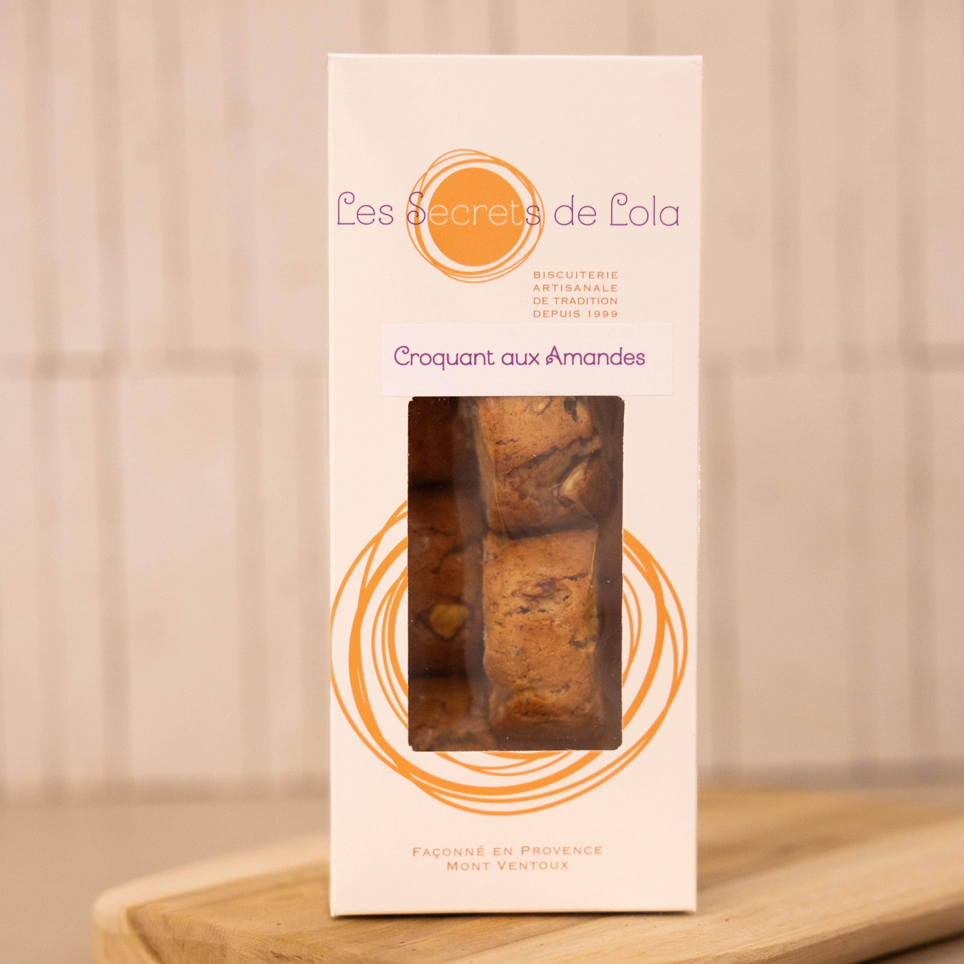 A stack of almond croquants, crunchy Provençal biscuits with a hint of vanilla, perfect for a sweet snack.

