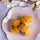 A stack of almond croquants, crunchy Provençal biscuits with a hint of vanilla, perfect for a sweet snack.