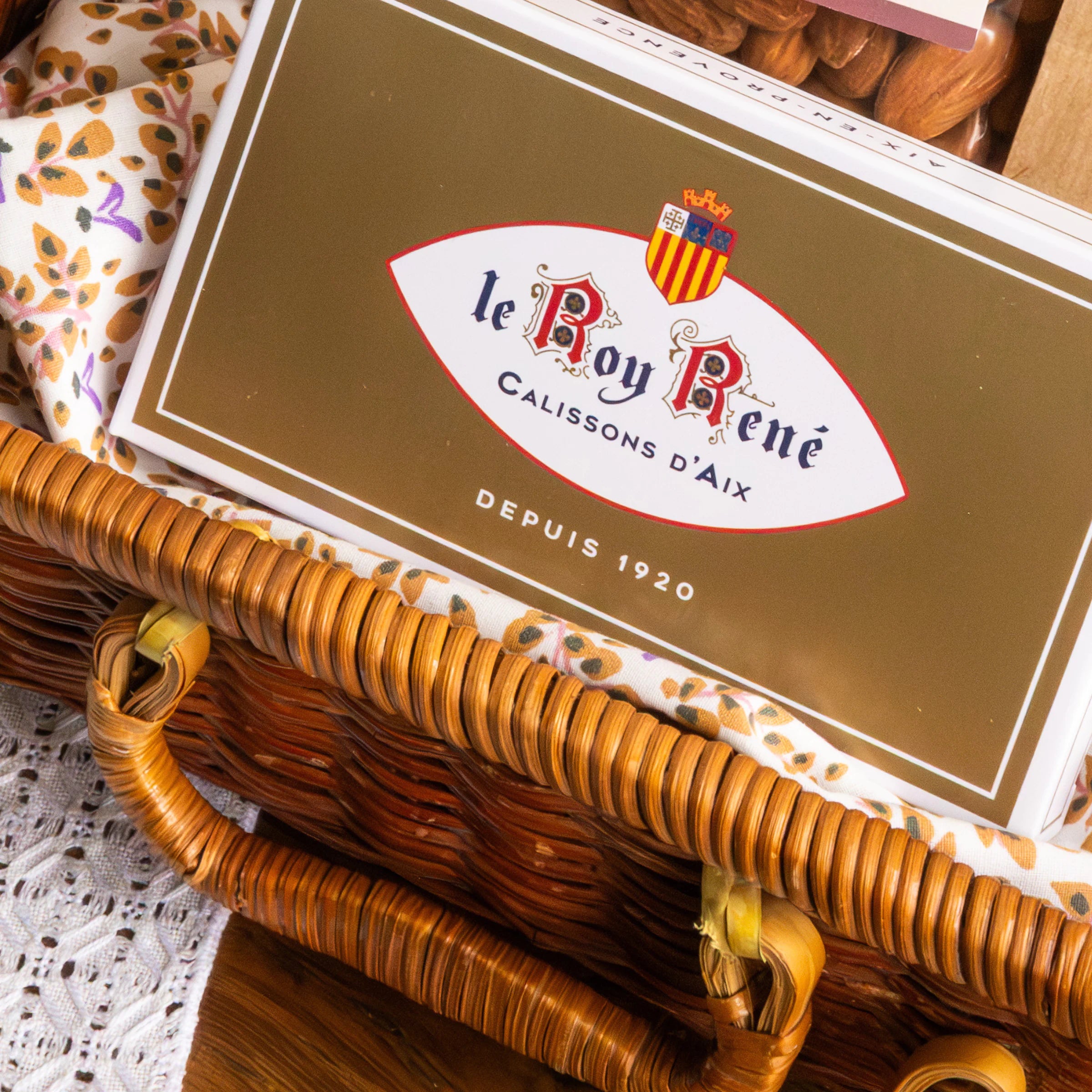 Le Roy René Calissons d'Aix box in a Provençal wicker gift basket, Céline en Provence