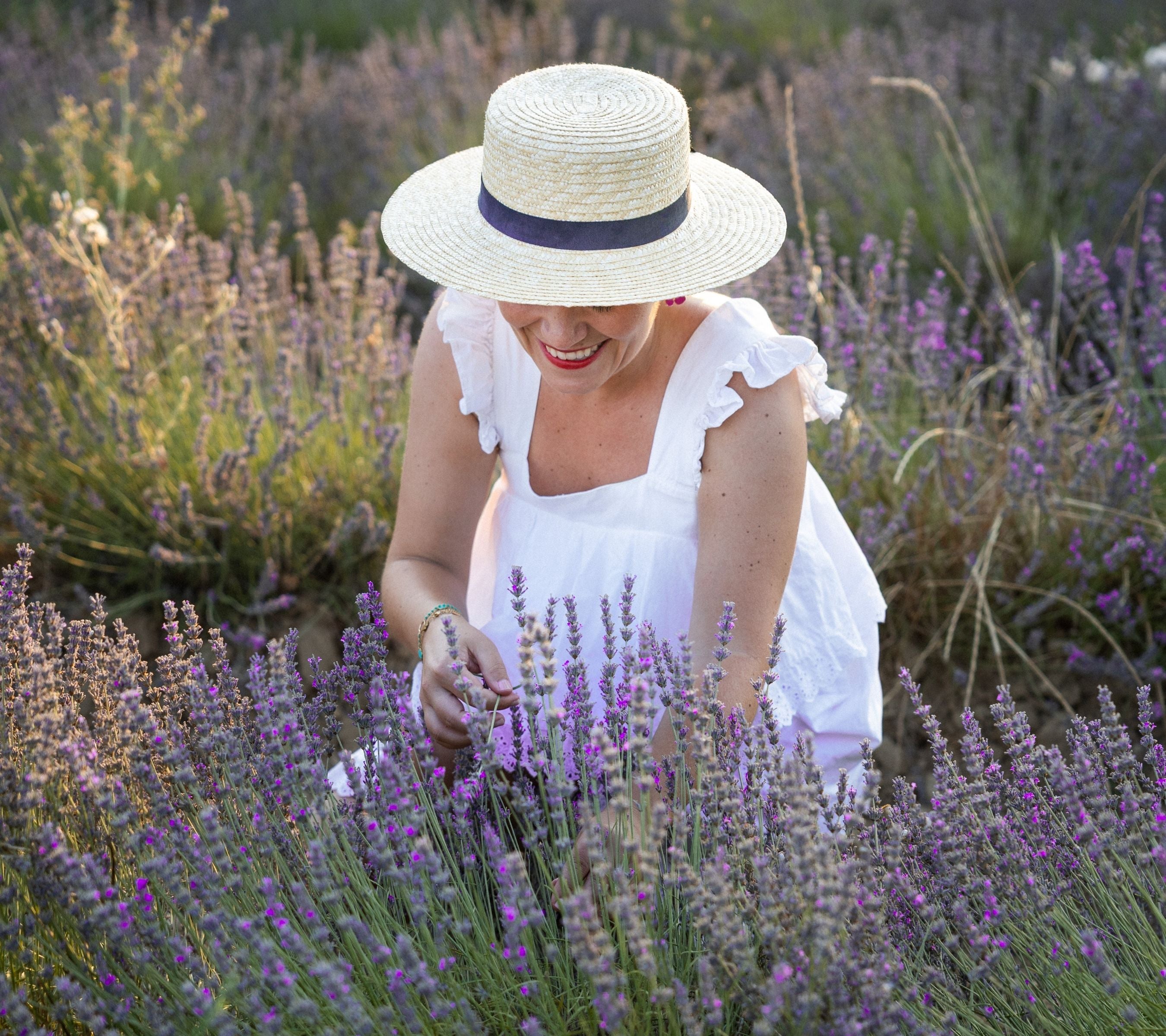 A warm portrait of Céline, the founder of Céline en Provence, sharing her story and passion for authentic Provençal slow living.
