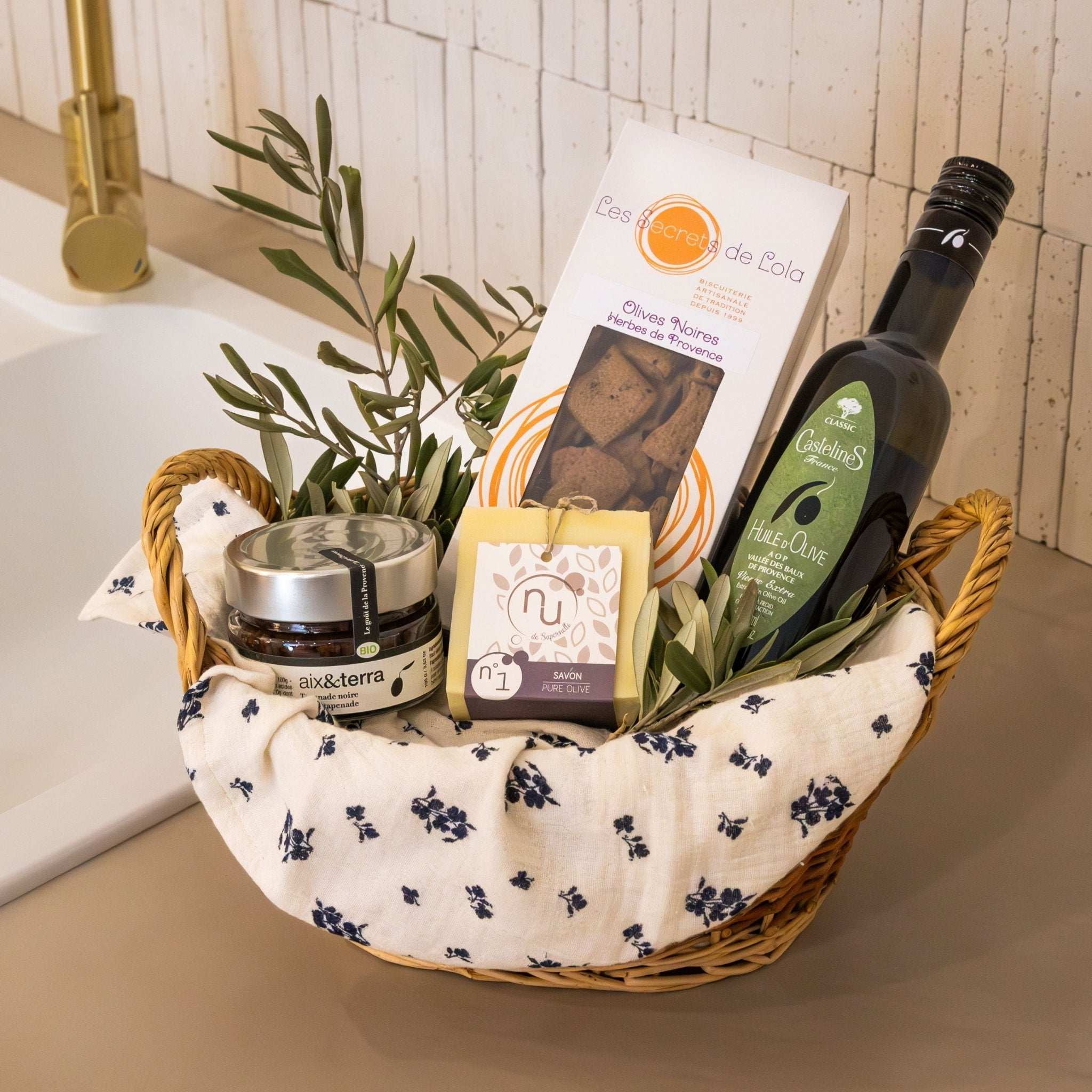 The Discover Olives gift box from Céline en Provence, containing Provençal olive oil, herb biscuits, tapenade, and olive soap.