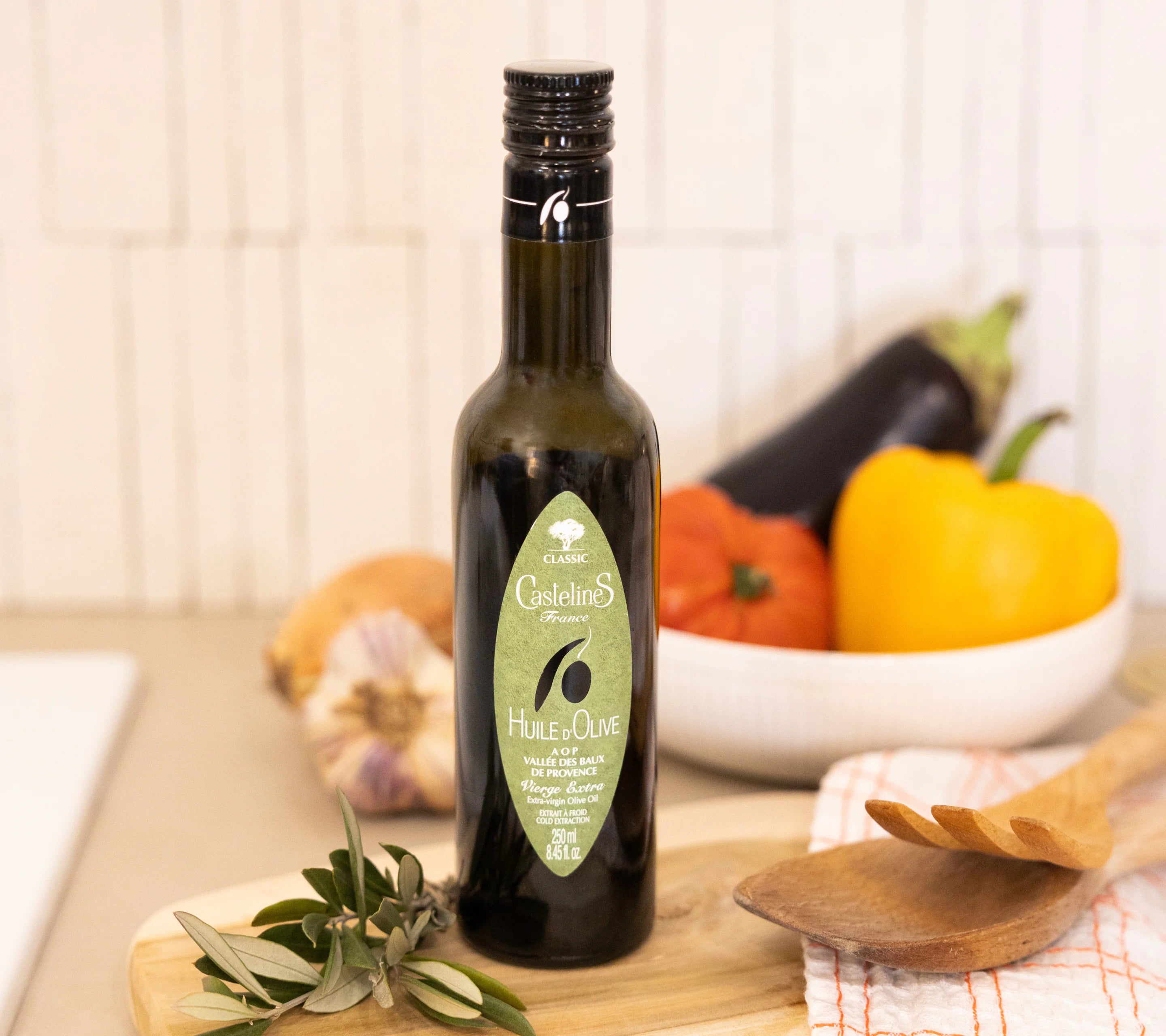 Castelines AOP extra virgin olive oil paired with Mediterranean vegetables and crusty bread, Provence
