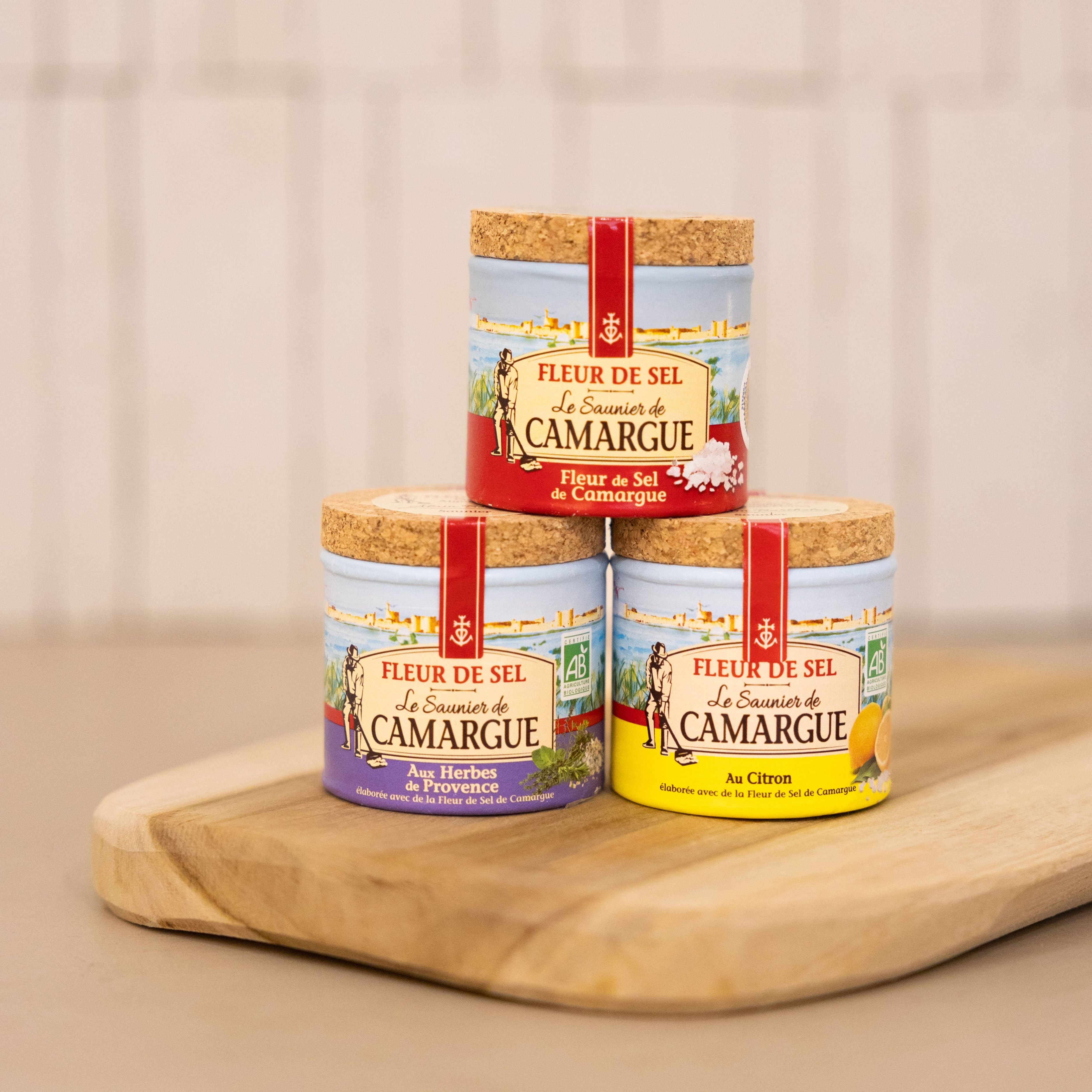 A trio of Fleur de Sel from Camargue, hand-harvested gourmet salt from Provence, perfect for seasoning meals.
