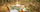 Summer Collection banner, Provençal table set outdoors under olive trees with olive oil and seasonal produce, summer in Provence