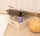 Organic Lavandin Grosso essential oil inside the Lavender Serenity Duo gift box on a white tray with dried lavender and diffuser