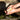 Hands holding a natural lavender soap bar by Nu de Sapernelle, Provence