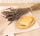 Natural lavender soap paired with dried lavender and a soft towel for a calming Provençal ritual