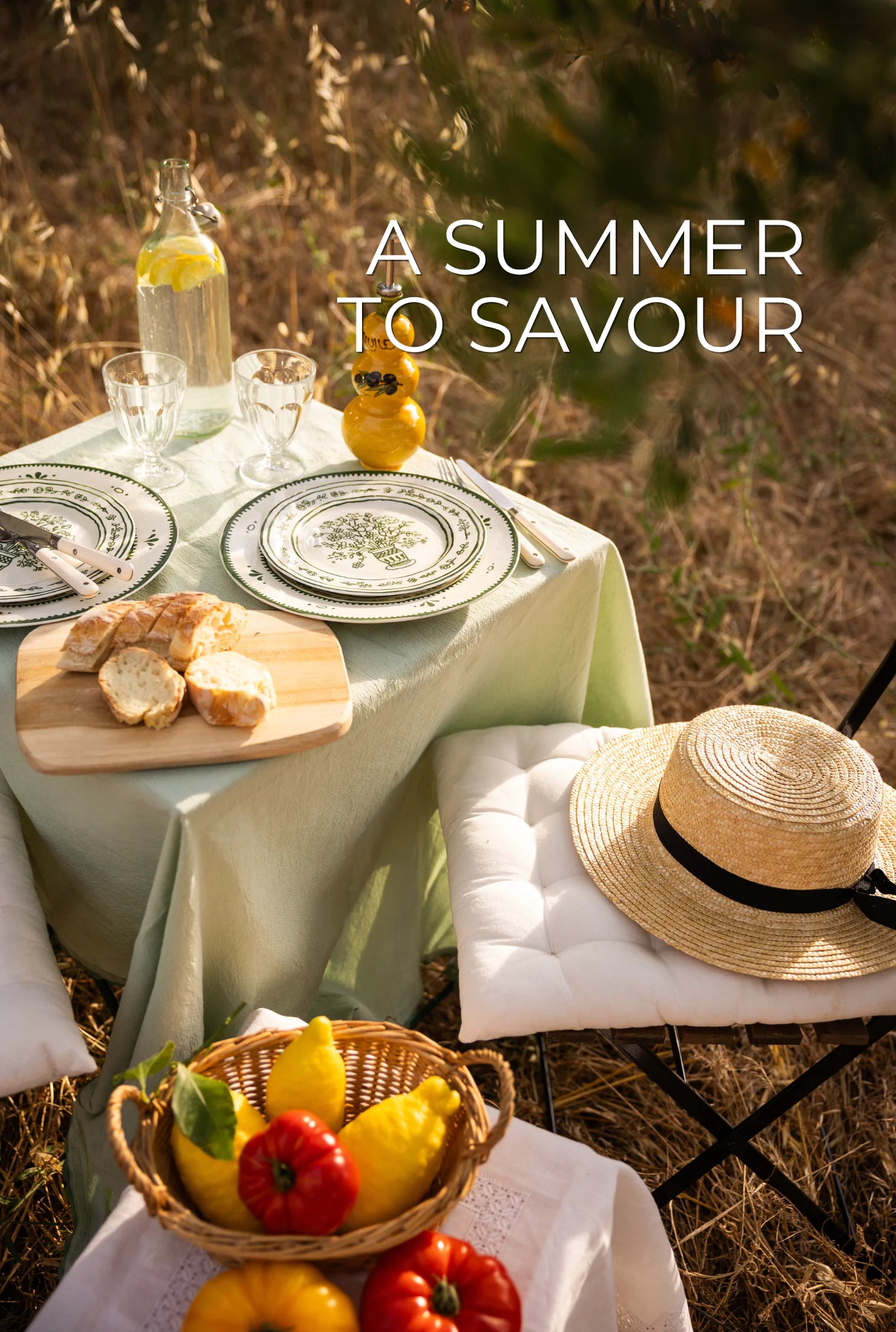 A Summer to Savour, Provençal outdoor table with bread, green plates and seasonal vegetables, Céline en Provence Summer Collection