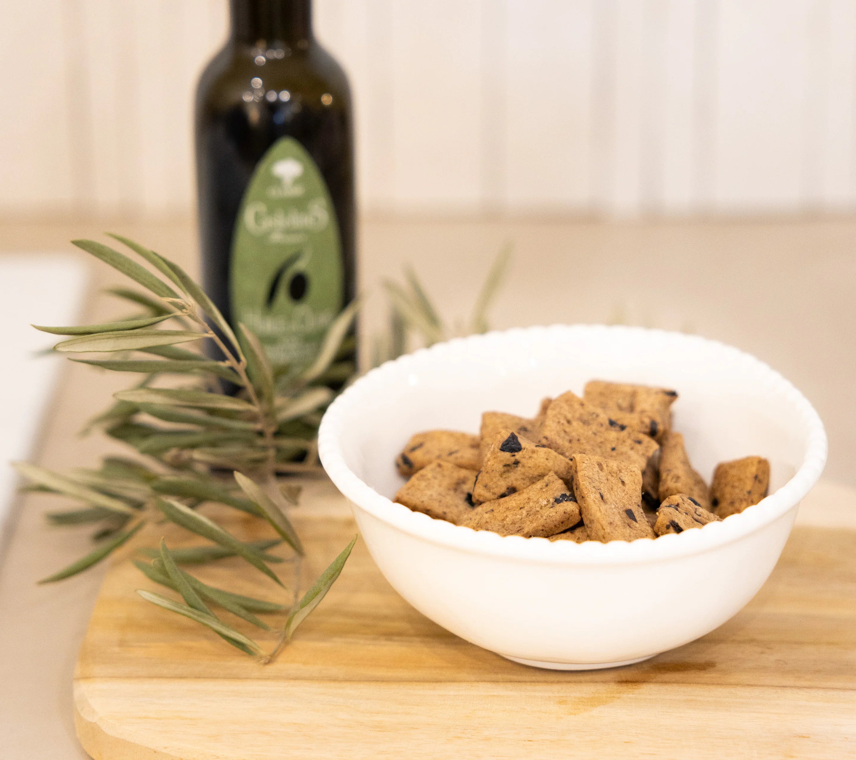 Provençal olive and herbs biscuits paired with extra virgin olive oil and herbal tea, savoury Provençal snack
