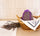 Organic Lavandin Grosso essential oil paired with lavender pouch in a wicker basket for a calming Provençal ritual