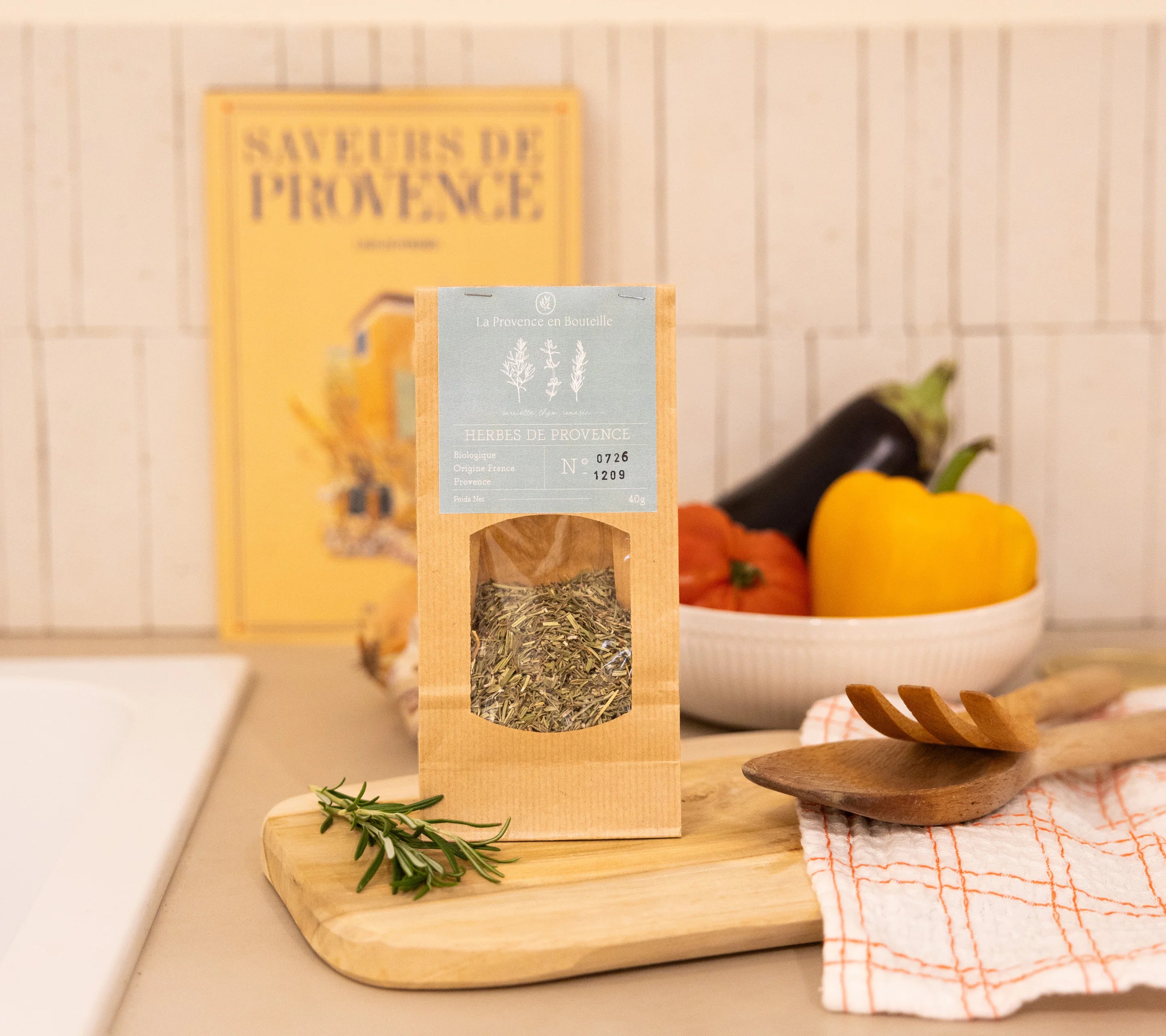 Organic Provence herbs paired with Mediterranean vegetables and rosemary for Provençal cooking
