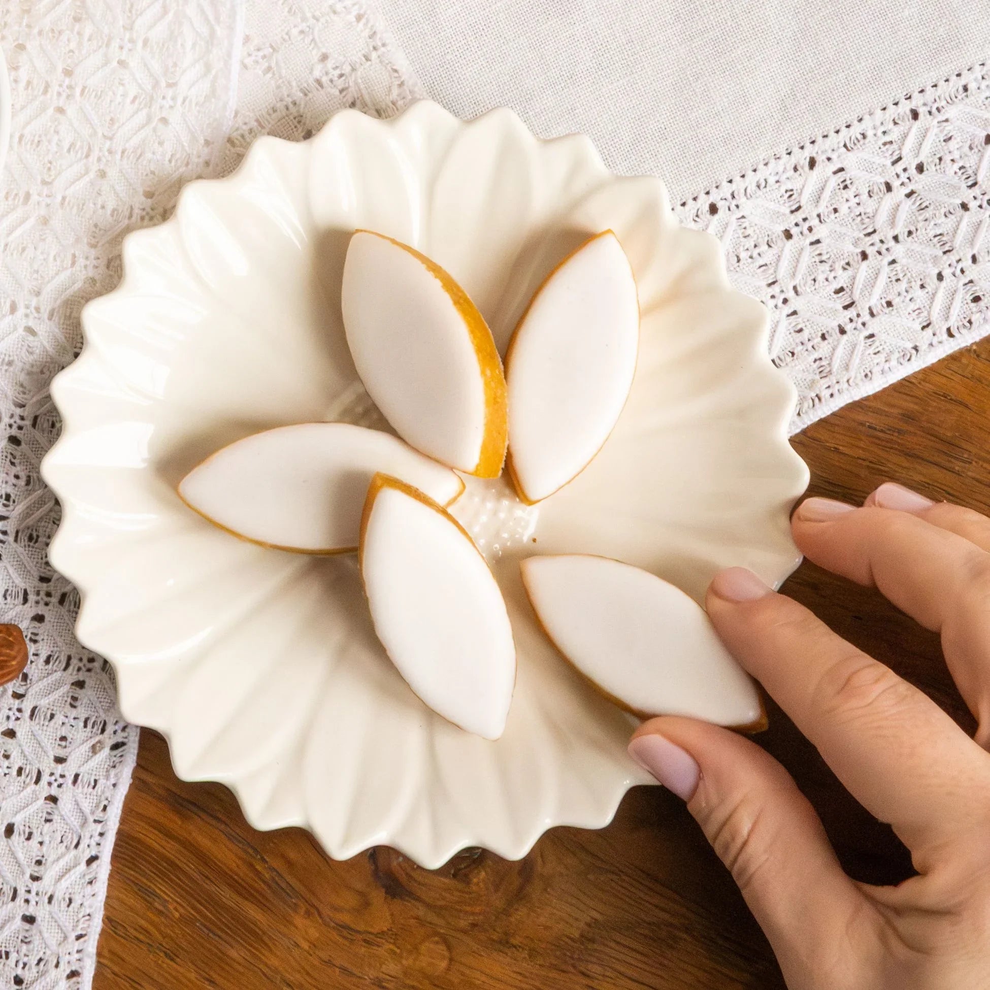 A plate of Calissons d'Aix, a traditional Provençal confectionery made from almonds, candied melon, and orange peel.
