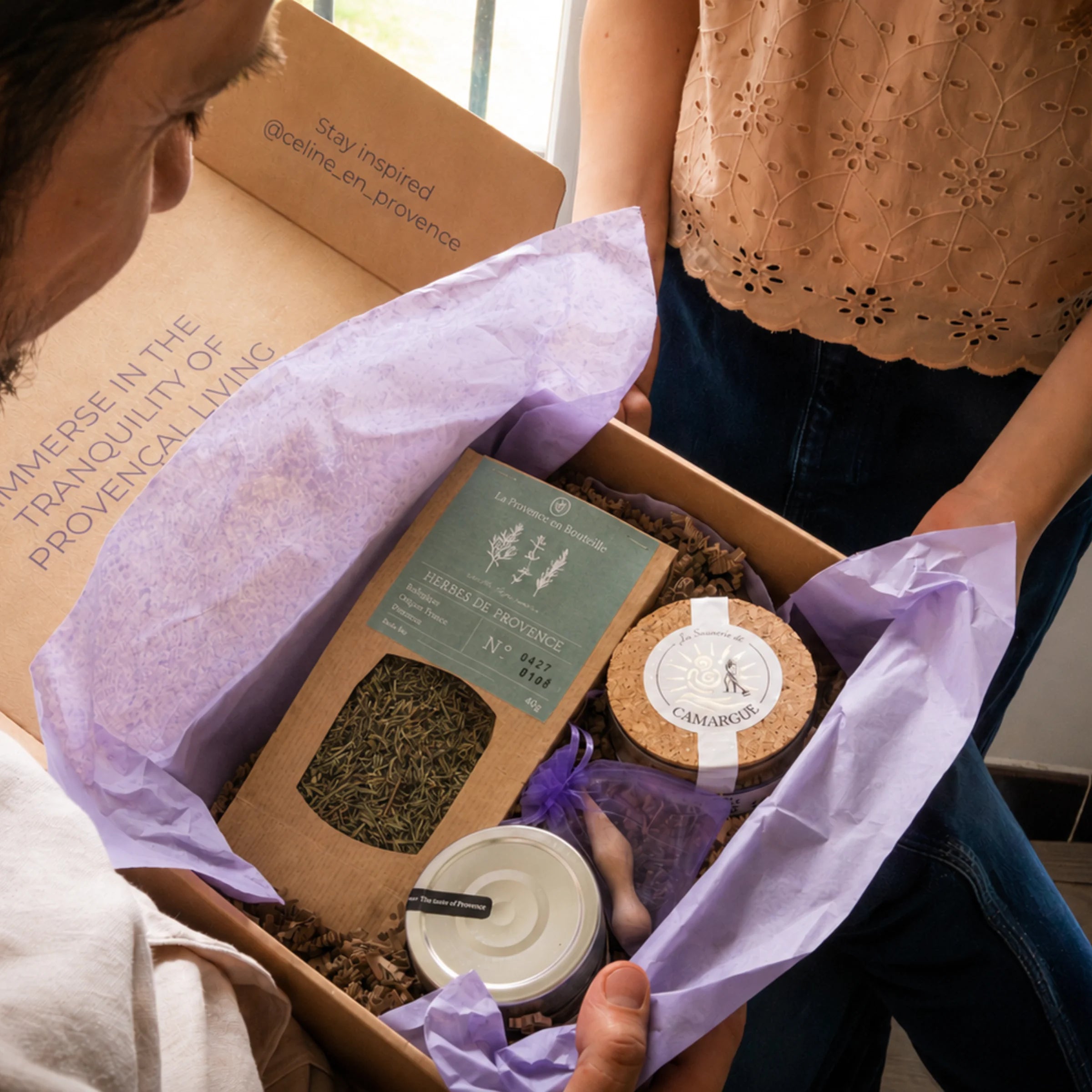 Céline en Provence signature gift box M open with lavender tissue paper, Céline's Choice sticker and Provençal products inside
