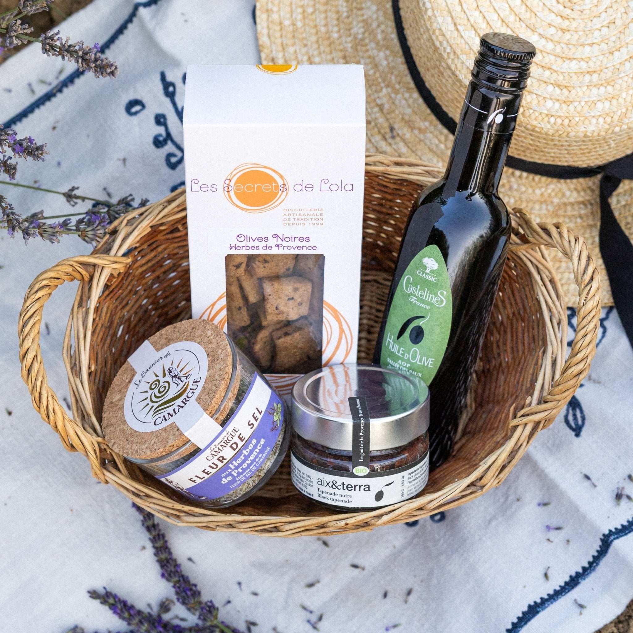 The Savoury Essentials gourmet box from Céline en Provence, containing olive oil, Fleur de Sel, tapenade, and biscuits, to bring authentic Provençal flavours to your table.