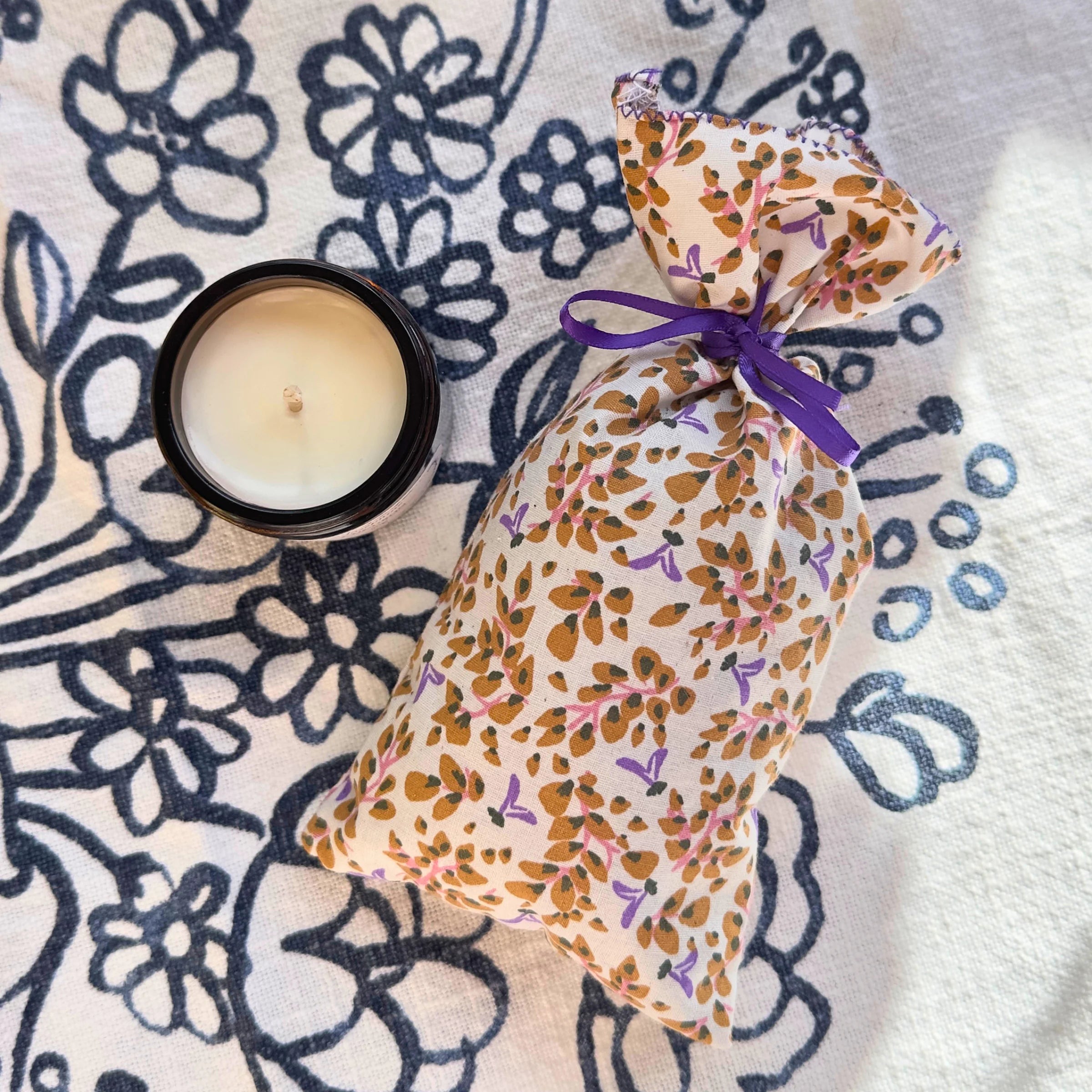 Thank You Teacher gift box variant C close-up with lit Cucuron scented candle and floral lavender pouch, Provençal end of year gift