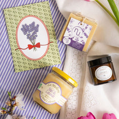 The Provence Escape Mother's Day gift box featuring lavender honey, artisanal soap, an almond scented candle, and a Provençal postcard, curated by Céline en Provence.