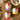 Overhead view of Trio Fleur de Sel de Camargue jars on wood with wooden salt spoon and olive branch